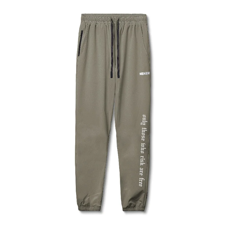 0494. Ultralight ""Patch Logo"" Relaxed Fit Track Pant - Faded Olive